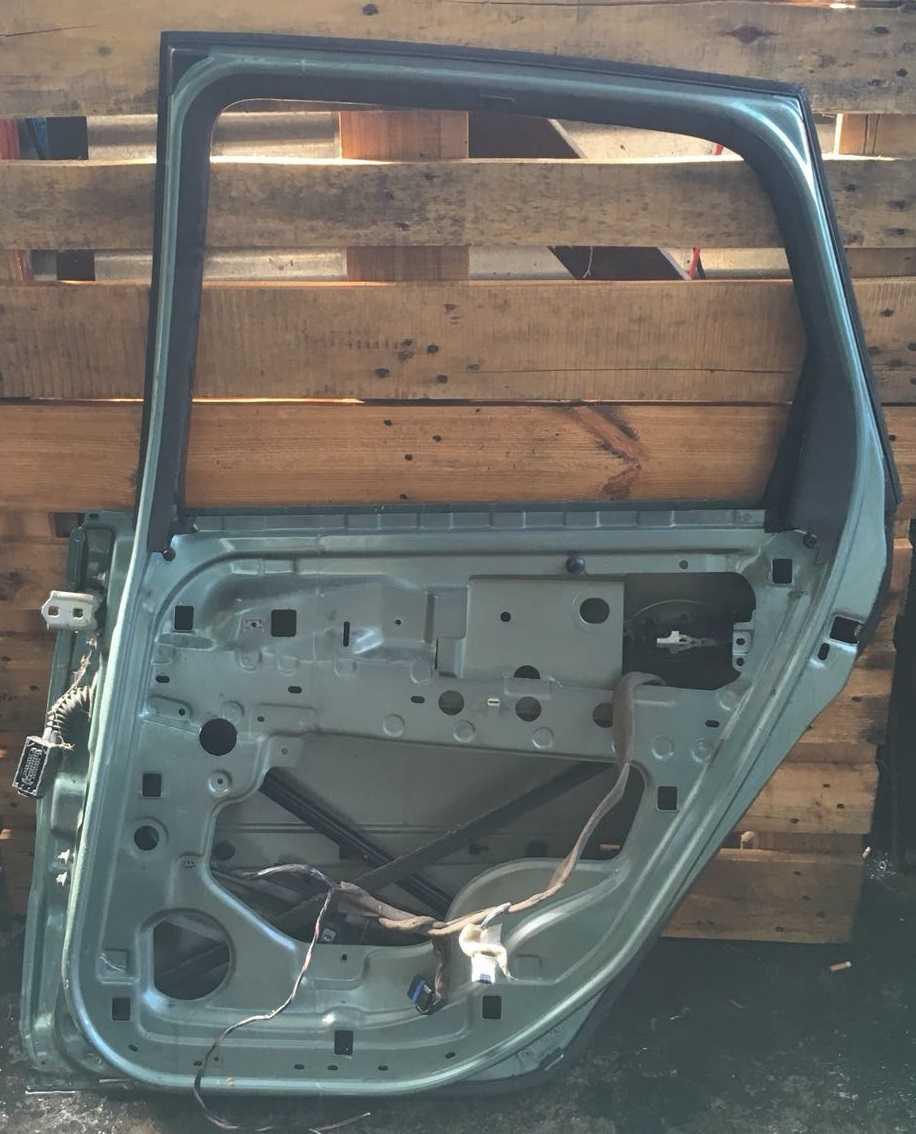 Portiera post dx renault scenic 2006 7751475409