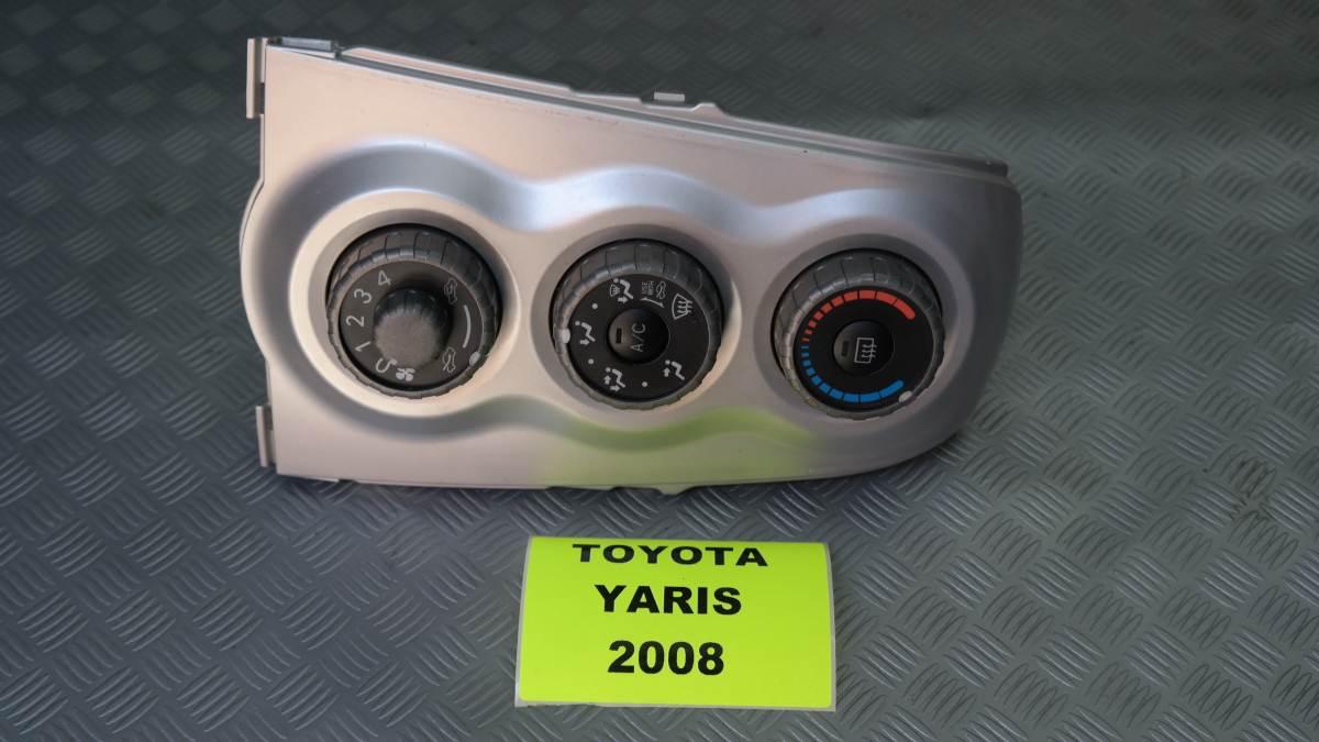 Toyota yaris comandi clima manuali