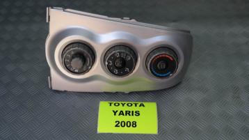 Toyota yaris comandi clima manuali